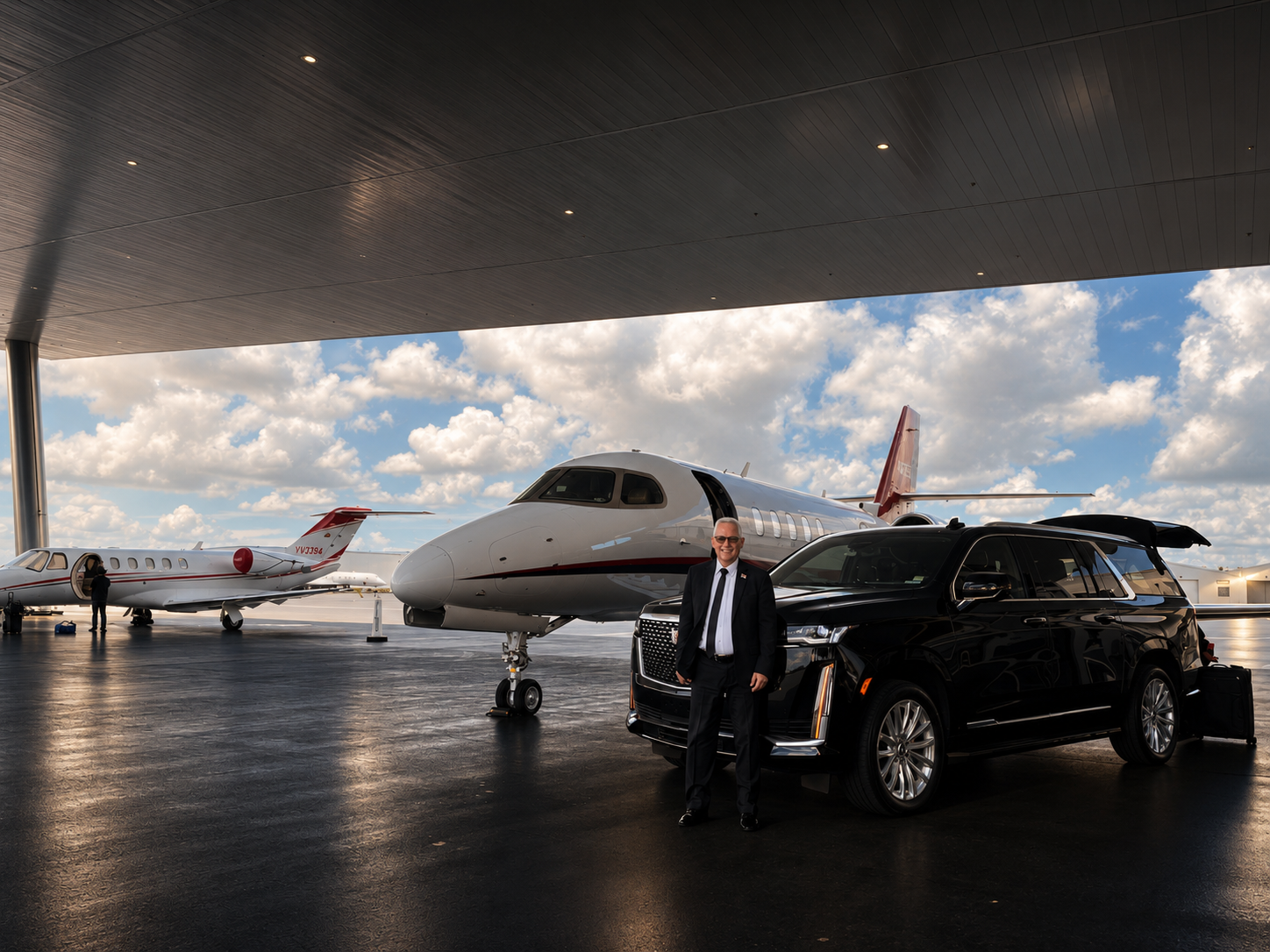 Premium black SUV and private jet at executive FBO terminal